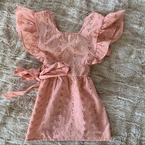 Pink eyelet pinafore style dress